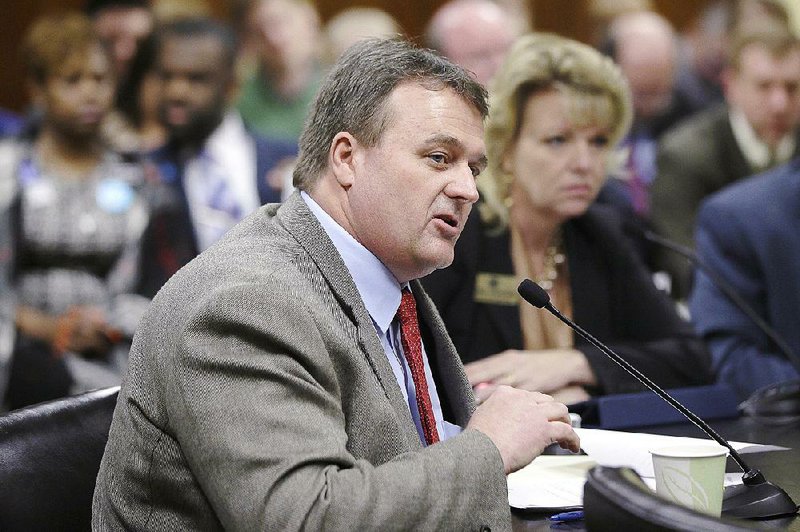 Sen. Blake Johnson, R-Corning, presents a bill at a meeting of the House Committee on Public Health, Welfare, and Labor at the Arkansas state Capitol in Little Rock, Ark., Thursday, March 26, 2015. 