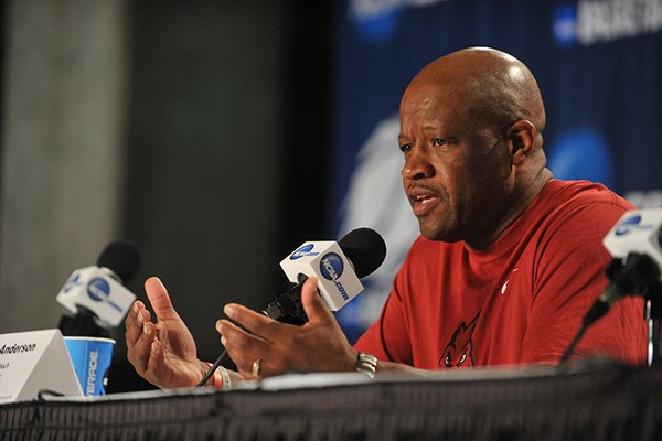 Arkansas coach Mike Anderson answers questions during a press conference Friday, March 20, 2015, at Veterans Memorial Arena in Jacksonville, Fla. 
