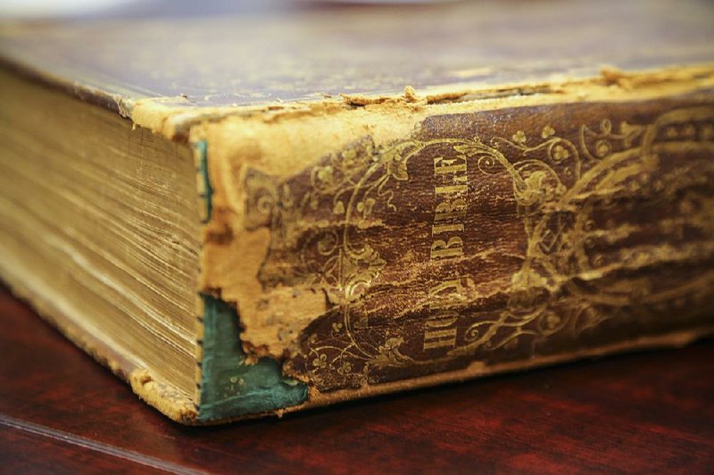 This family Bible, its spine tattered by age, was used by U.S. Rep. French Hill as he was sworn in to Congress in January. 