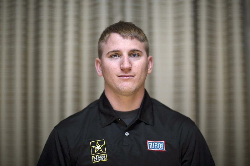 Specialist Samuel Scudder, a soldier in the Army National Guard who is competing in the 2015 Army Trials at Fort Bliss in El Paso, Texas. The trials determine which ill or injured Army athletes will move on to compete in the Department of Defense's 2015 Warrior Games. He injured his knee and suffered some nerve damage when he deployed with his unit to Kabul, Afghanistan last year. 