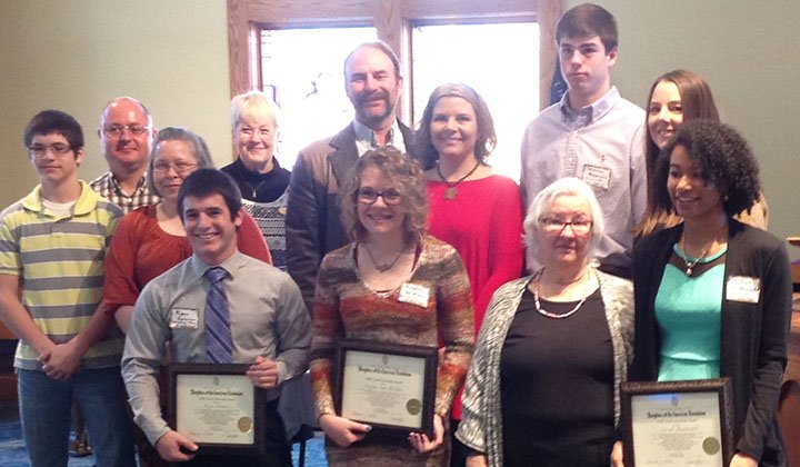 Submitted photo DAR HONOREES: Nine students were awarded the DAR Youth Citizenship Award. Among those attending were Ronnie Graves, from left, with parents Chad and Schelly, and Ryan Graves; Akansa National Defense Chair Cathy Carr; father Scott McAdoo, Kaylee and mother Tammy; top right, Steven Benson and mother Chris; and Grandmother Maris Macdonald and Juliet Macdonald.