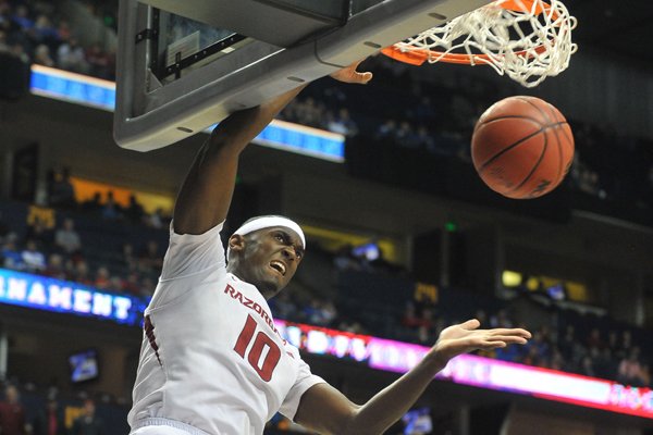 Arkansas forward Bobby Portis goes up for the dunk in first half against Tennessee in the 2015 SEC basketball tournament on Friday, March 13, 2015, at Bridgestone Arena in Nashville.
