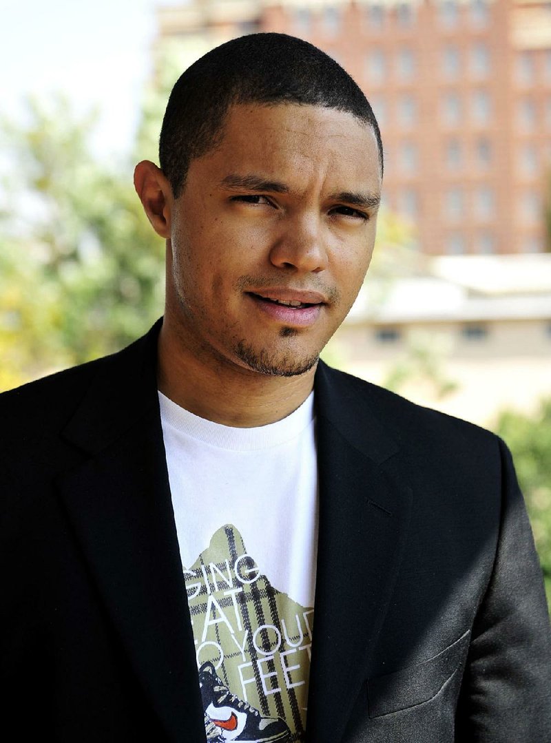 In this photo taken Oct. 27 2009 South African comedian Trevor Noah is photographed during an interview. Trevor Noah, a 31-year-old comedian from South Africa who has contributed to "The Daily Show" a handful of times during the past year, will become Jon Stewart's replacement as host, Comedy Central announced Monday March 30, 2015. Noah was chosen a little more than a month after Stewart unexpectedly announced he was leaving "The Daily Show" following 16 years as the show's principal voice. (AP Photo/Bongiwe Mchunu-The Star) SOUTH AFRICA OUT NO SALES NO ARCHIVE