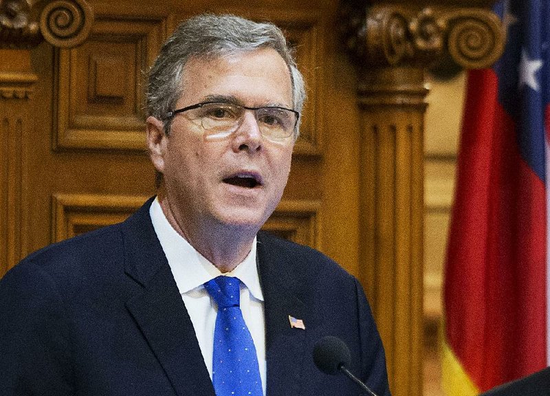  In this March 19, 2015 file photo, former Florida Gov. Jeb Bush speaks to lawmakers on the Georgia House floor in Atlanta. 
