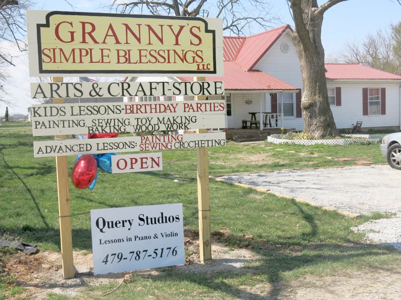Photo by Susan Holland The sign in front of Granny&#8217;s Simple Blessings announced it was open last Thursday after Holly Wallace unlocked the doors for her first day in business.