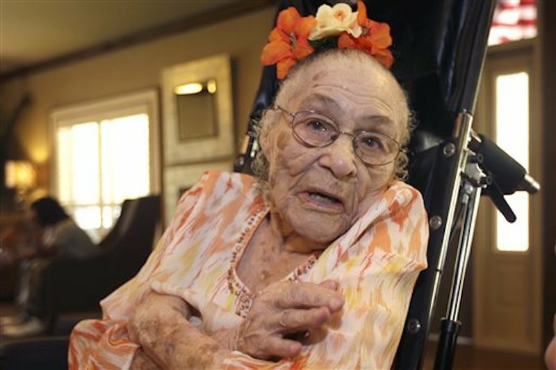 Gertrude Weaver, who on April 1, 2015, became the oldest person in the world, is seen Thursday, July 3, 2014, photo, a day before her 116th birthday. 