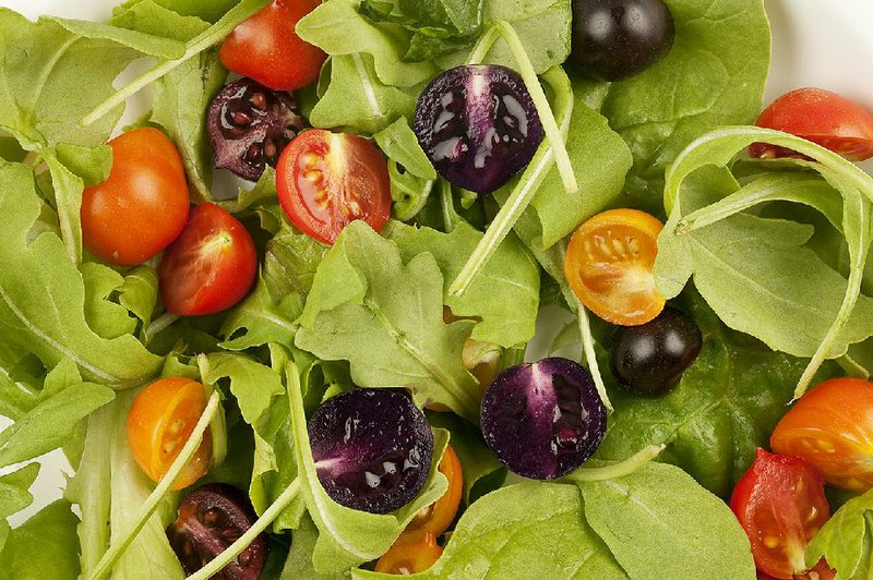 An image provided by The John Innes Centre shows a salad made with red and purple tomatoes. A British company wants U.S. permission to produce and sell a genetically modified variety of purple tomato. 