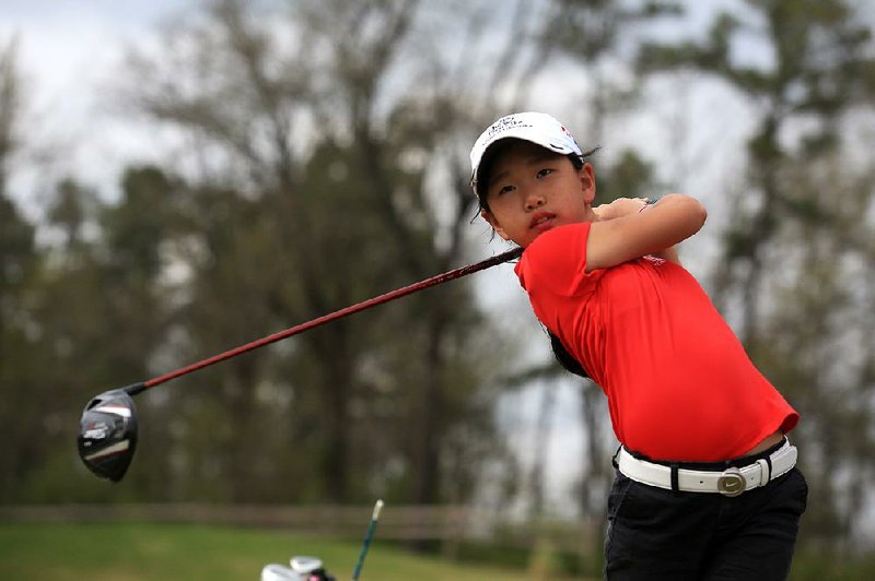 Arkansas Democrat-Gazette/RICK MCFARLAND --01/02/15--    McKenzie Lee, who will represent Arkansas at the national drive, chip an putt contest at Augusta National prior to The Masters. Lee was hitting tee shots Wednesday at the First Tee of Arkansas in Little Rock 