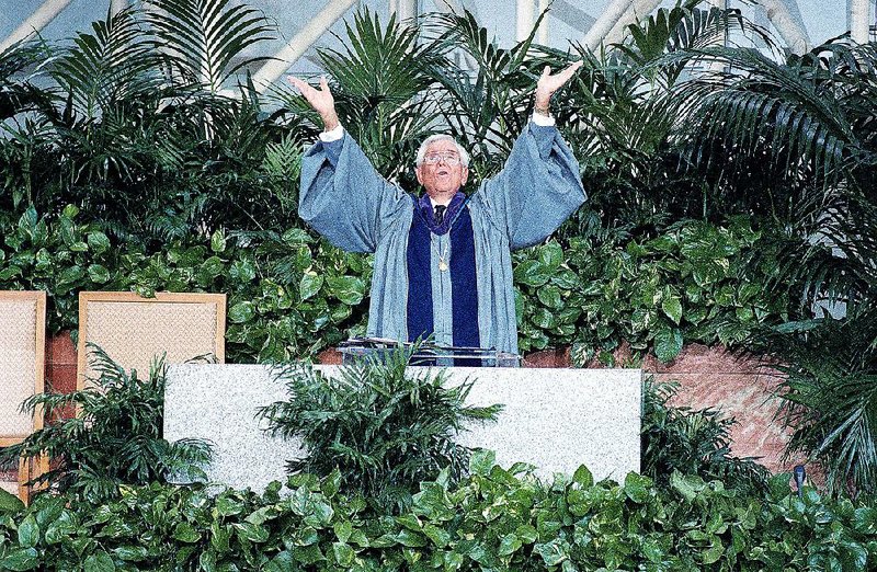 FILE - In this Jan. 28, 1996, file photo, Rev. Robert H. Schuller, pastor of the Crystal Cathedral in Garden Grove, Calif., speaks at the church. Schuller, the Southern California televangelist who brought his message of "possibility thinking" to millions, died early Thursday, April 2, 2015, in California. He was 88. (AP Photo/Michael Tweed, File)