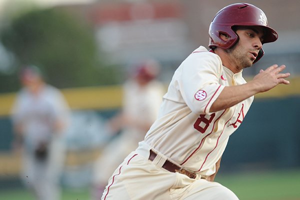 Tyler Spoon of Arkansas rounds third and heads to the plate against Mississippi Valley State during the first inning Tuesday, April 7, 2015, at Baum Stadium in Fayetteville.