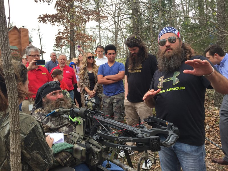 Willie Robertson, right, paid a visit to Steve Swope, seated.