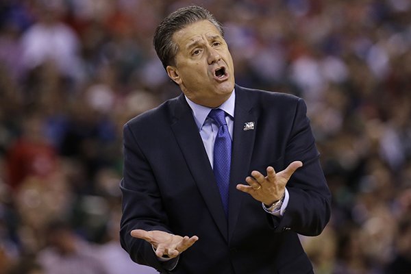 Kentucky head coach John Calipari reacts to a call during the second half of the NCAA Final Four tournament college basketball semifinal game against Wisconsin Saturday, April 4, 2015, in Indianapolis. Wisconsin won 71-64. (AP Photo/David J. Phillip)