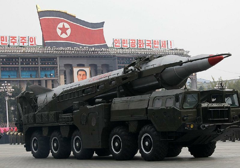 A truck hauls a missile in Pyongyang, North Korea, in this Oct. 10, 2010, file photo. Researchers said technological and engineering challenges are preventing North Korea from developing reliable missiles that can reach the U.S. 