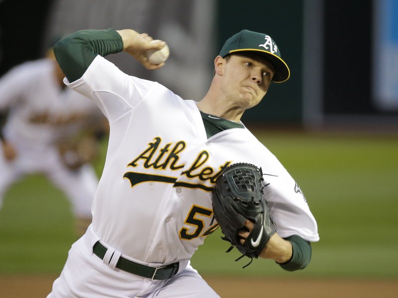 Ben Zobrist of the Oakland Athletics hits a double against the Texas