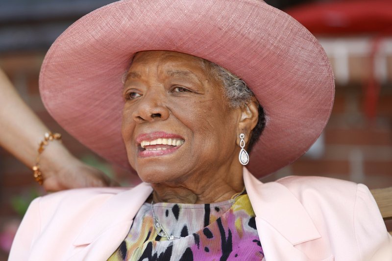 FILE - In this May 20, 2010 file photo, Maya Angelou smiles as she greets guests at a garden party at her home in Winston-Salem, N.C. TV host and author Tavis Smiley and director Kenny Leon are developing a play based on Smiley’s new book about his long friendship with Maya Angelou, “My Journey With Maya.” 