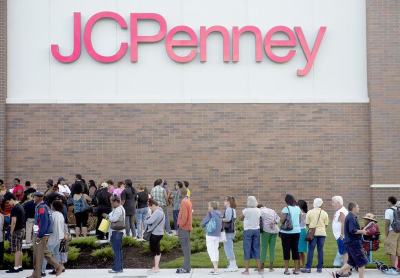 Bloomberg Photo Service 'Best of the Week': Customers line up during the grand opening of a new J.C. Penney Co. store in the Brooklyn borough of New York, U.S., on Friday, Aug. 29, 2014. J C. Penney Co. opened its first-ever store in Brooklyn, located in phase two of Gateway Center, further increasing its New York City footprint. Photographer: Victor J. Blue/Bloomberg