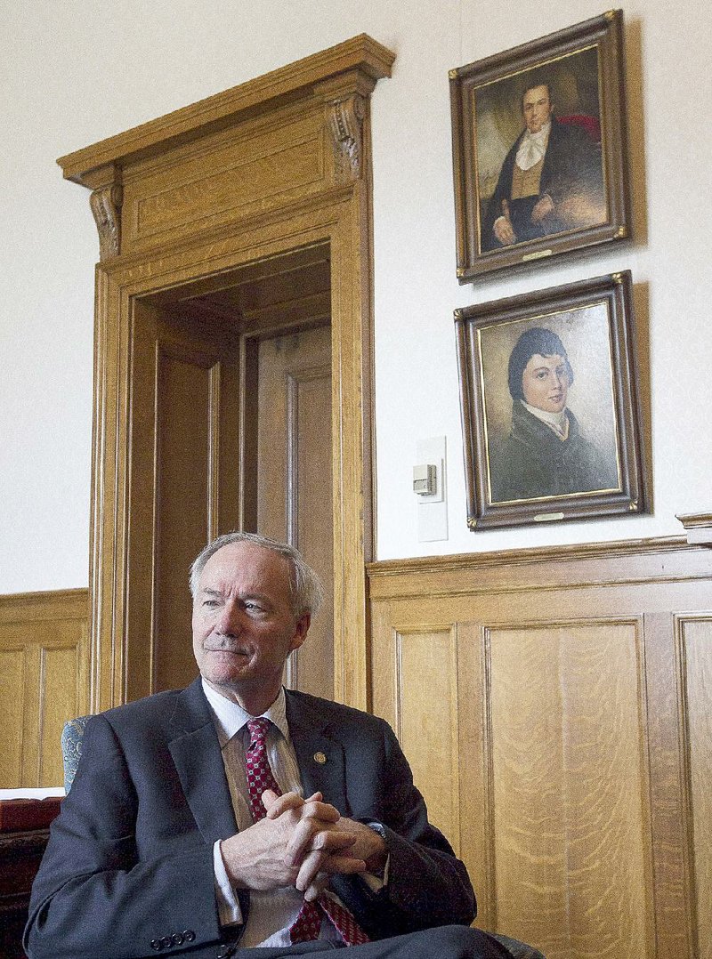 Arkansas Democrat-Gazette/BENJAMIN KRAIN --4/9/15--
During a press interview Thursday in his office, Gov Asa Hutchinson said he was pleased with the results of this legislative session and talked about the possibility of calling for a special session after a legislative task force studying the private option and the state's Medicaid program makes it reccomendations by the end of this year.