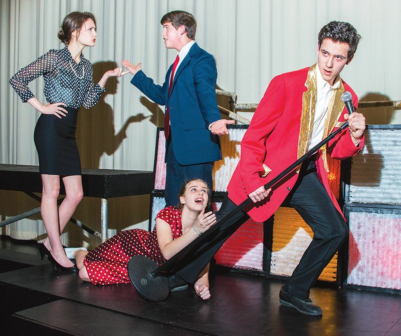 The Clinton High School Drama Department will present Bye Bye Birdie on Friday, Saturday and April 19 in the Clinton School Auditorium. Appearing in the musical are, standing, from left, Whitney Wilkins as Rosie and Josh Pryor as Albert Peterson; and in the foreground, Kayla Meeler as Kim and Shelby Pistole as Conrad Birdie.