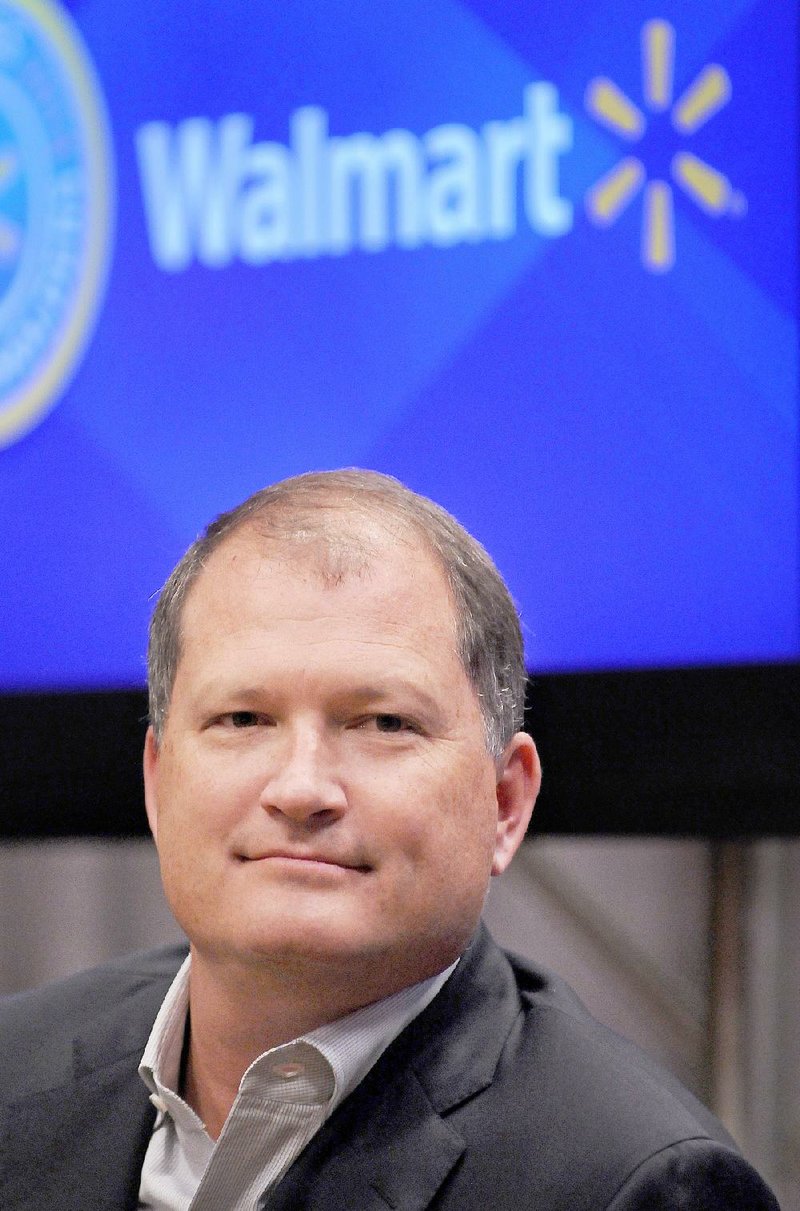 Neil Ashe, President and CEO, Global eCommerce for Wal-Mart Stores, Inc, speaks during a press conference at the Embassy Suites Northwest Arkansas in Rogers on Thursday June 5, 2014. 