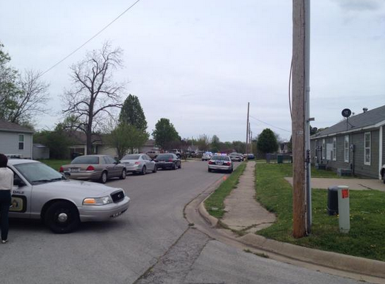 Police block the road near the scene of a drive-by shooting Springdale. 