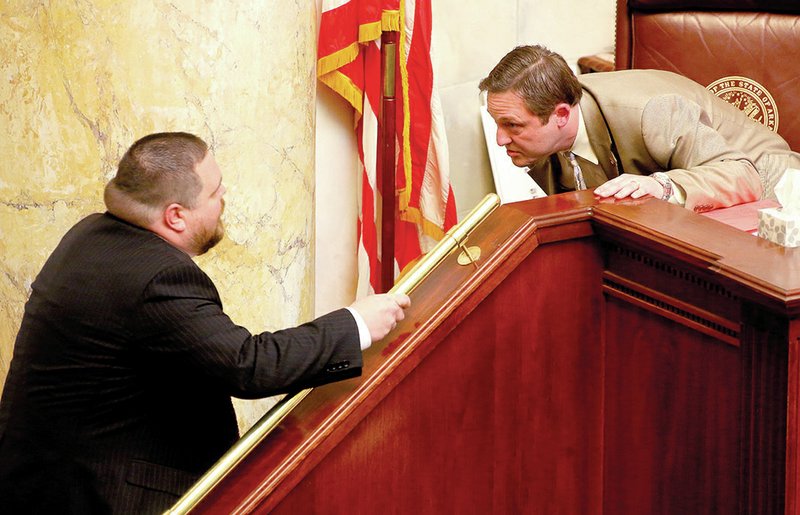 State Rep. Bob Ballinger (left) talks with House Speaker Jeremy Gillam on March 30 during work on Ballinger’s Religious Freedom Restoration Act. “I cannot imagine someone doing a better job than he did,” Ballinger said of Gillam’s work as speaker.