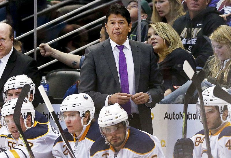 Buffalo Sabres coach Ted Nolan watches his team play the Colorado Avalanche in the third period of an NHL hockey game Saturday, March 28, 2015, in Denver. Colorado won 5-3. (AP Photo/David Zalubowski)