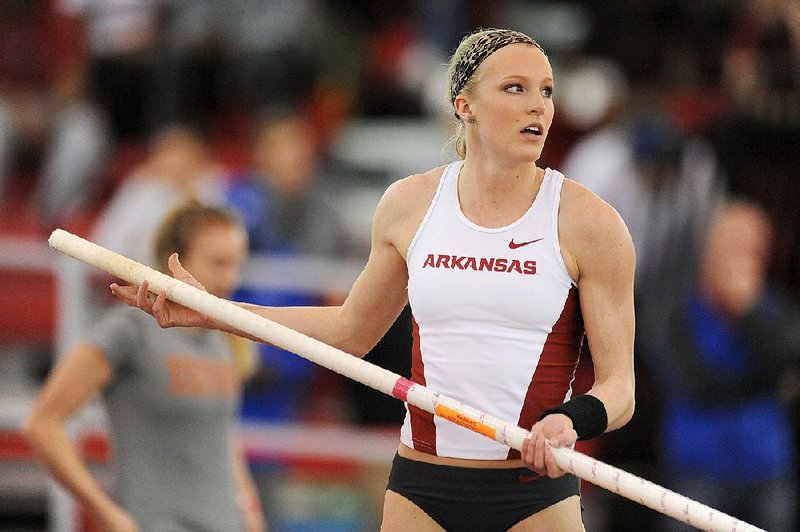Arkansas’ Sandi Morris broke the college outdoor pole vault record Saturday by clearing 15 feet, 1 3/4 inches.