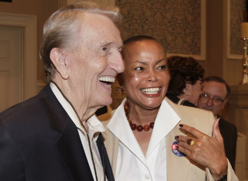 Sen. Joyce Elliott, D-Little Rock, right, speaks with former U.S. Sen. Dale Bumpers, D-Ark., before a meeting of the Political Animals Club in Little Rock, Ark., Thursday, June 24, 2010 in this file photo.