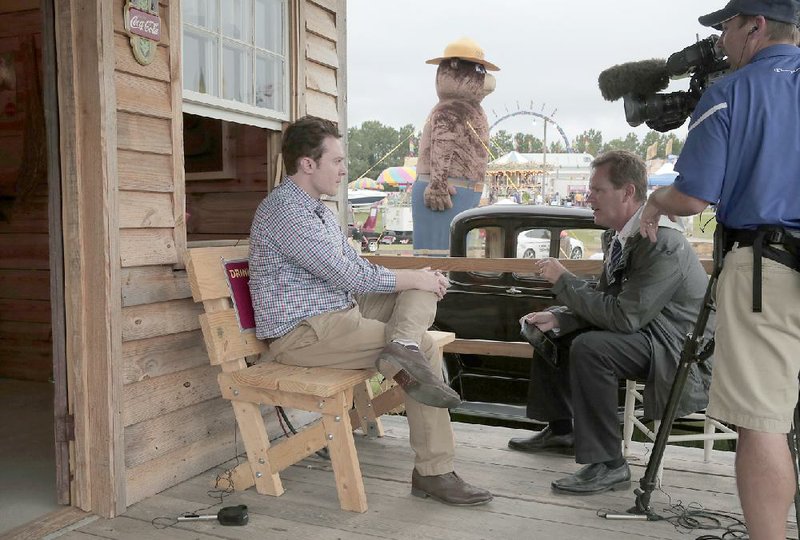 Clay Aiken sits for a TV interview last fall while campaigning for Congress in Sanford, North Carolina. Illustrates TV-AIKEN (category e), by Ben Terris  2015, The Washington Post. Moved Wednesday, April 8, 2015. (MUST CREDIT: Photo for The Washington Post by Ted Richardson.)