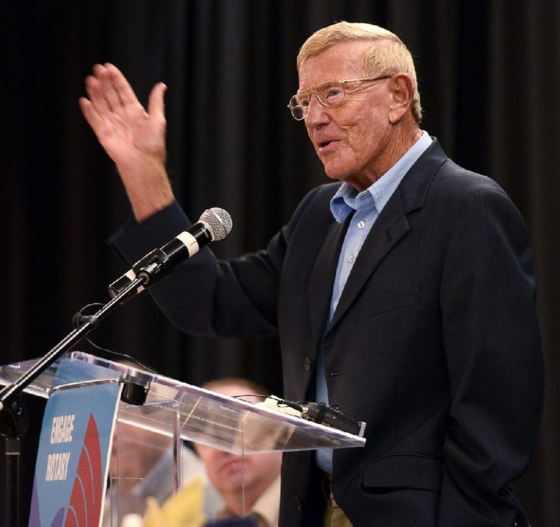 STAFF PHOTO ANTHONY REYES
Former Arkansas/Notre Dame coach Lou Holtz serves as the guest speaker Monday Sept. 23, 2013 at the Springdale RotaryClub and NWA Touchdown Club luncheon at the Springdale Holiday Inn in Springdale. Holtz told stories from his coaching and broadcasting careers and some of the his opinions on the sport today.