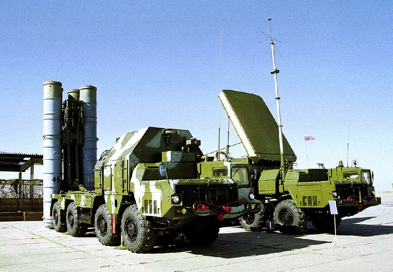 FILE - In this undated file photo a Russian S-300 anti-aircraft missile system is on display at an undisclosed location in Russia. The Kremlin says Russia has lifted its ban on the delivery of a sophisticated air defense missile system to Iran. Russia signed the $800 million contract to sell Iran the S-300 missile system in 2007, but later suspended their delivery because of strong objections from the United States and Israel. The decree signed Monday, April 13, 2015, by President Vladimir Putin allows for the delivery of the missiles. (AP Photo/File)