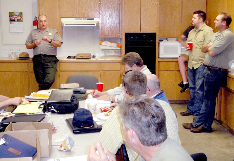 Staff photograph Kevin Eads, superintendent of Pea Ridge National Military Park, told members of Benton County Quail (formerly the Benton County chapter of Quail Unlimited) about how the vegetation management plan is improving quail habitat at the park. The group recently donated $2,500 to help fund the plan. After Eads outlined the plan&#8217;s goal of restoring the vegetation to how it looked in March 1863 (when the battle happened), a number of the 30 or so members present volunteered time and equipment.