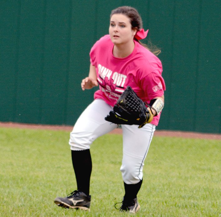 Courtesy photo Prairie Grove&#8217;s Brooke Ketzler comes up to make a catch in the outfield. The Lady Tigers sported pink uniforms but lost a pair of pink-out games on Saturday at Gravette.