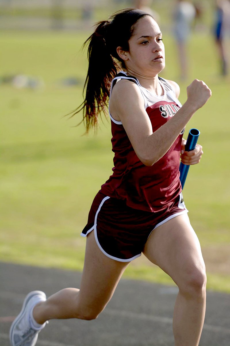 Bud Sullins/Special to the Herald-Leader Angelica Lange and the Siloam Springs 4x100-meter relay team finished first at the Panther Relays with a time of 54.73 seconds.