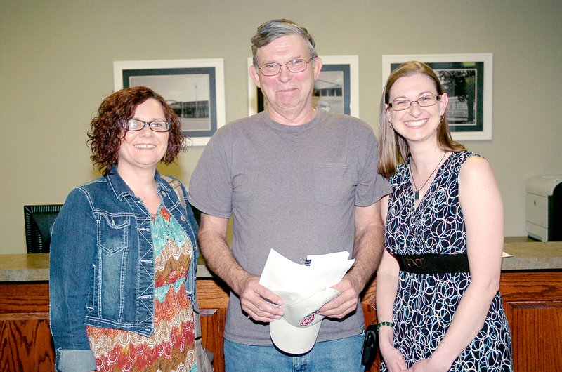 RICK PECK MCDONALD COUNTY PRESS The McDonald County Board of Education recognized White Rock School staff members as the school district&#8217;s Employees of the Month for April at its April 9 meeting. From left to right: Lori Ledford, health aide, secretary and bus driver, Harry Gann, custodian, and Kristee Bloom, resource teacher.