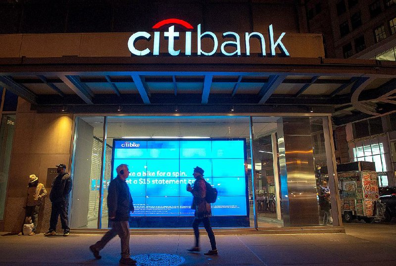 Pedestrians pass a Citigroup Inc. Citibank branch in New York last week. The company on Thursday reported a $4.8 billion profit in the first three months of the year. 