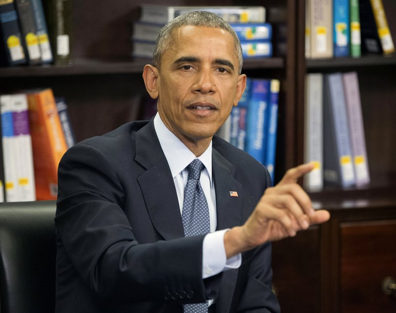 In this April 7, 2015, photo, President Barack Obama speaks at Howard University in Washington, at the university's medical center to discuss the impact of climate change on public health and steps his administration is taking to reduce the health impacts of climate change on communities.