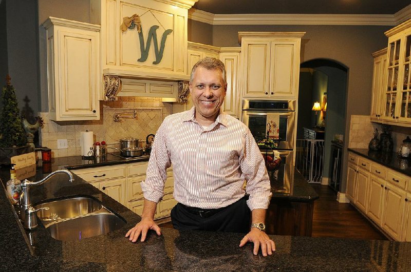  Todd Whatley. in his favorite spot, his kitchen Tuesday April 14, 2015.