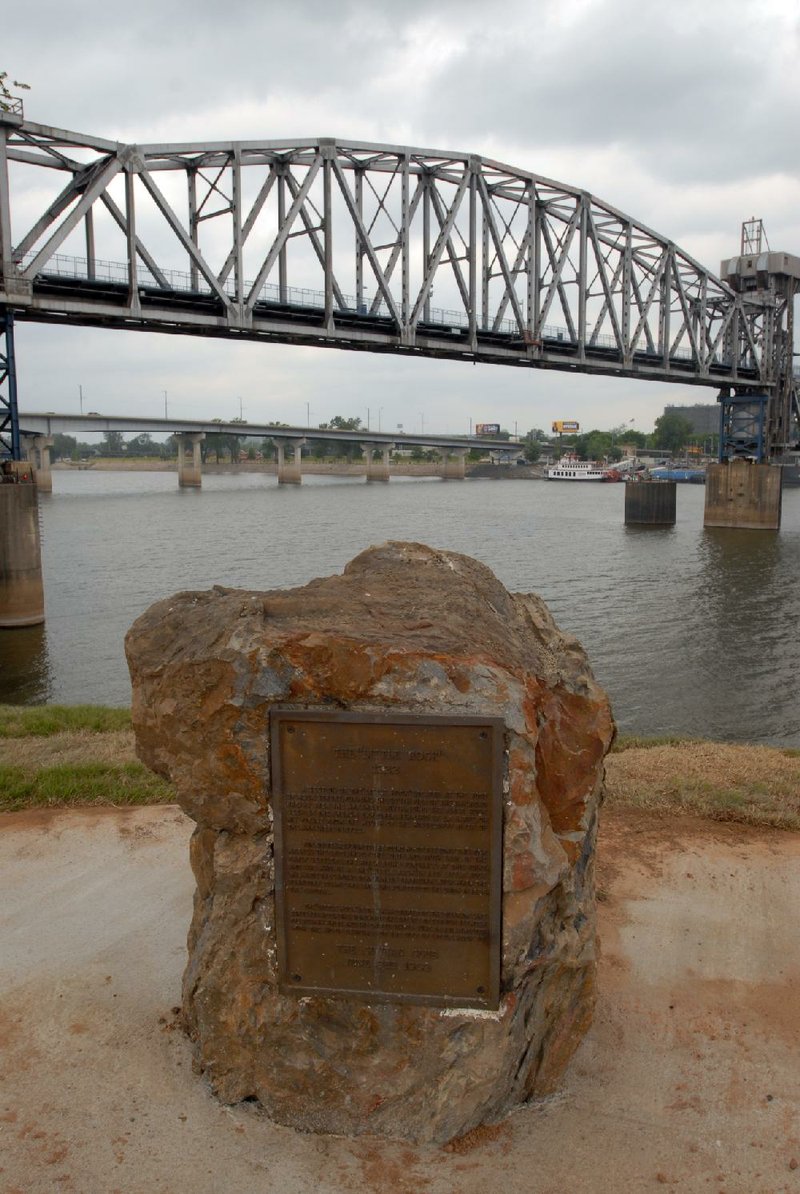 This small piece of the “Little Rock” and the actual outcropping beyond are being moved to the Arkansas River’s north shore through the largesse of the Stephens family.