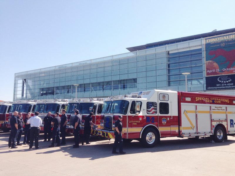 The Little Rock Fire Department's new trucks, worth a total of $3.9 million, displayed outside the Clinton Presidential Center on Monday, April 20, 2015. 
