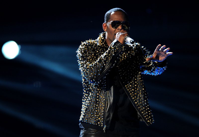 AP/FRANK MICELOTTA/INVISION R. Kelly performs onstage at the BET Awards at the Nokia Theatre in Los Angeles in 2013. The owners of 5001 Flavors knew when they started the company 23 years ago they wanted to sell custom-made clothes to rap and R&amp;B musicians. (Photo by Frank Micelotta/Invision/AP)