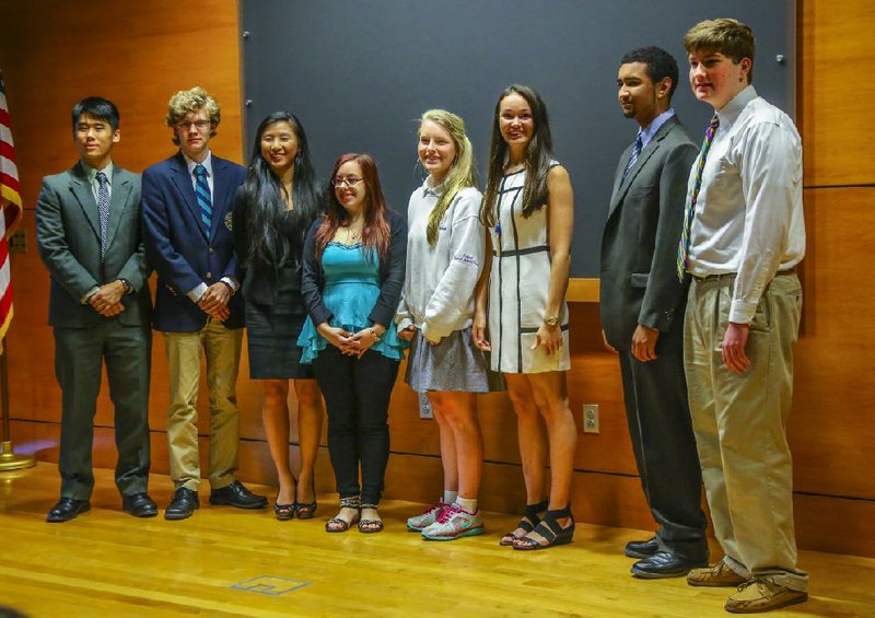 4/20/15
Arkansas Democrat-Gazette/STEPHEN B. THORNTON
Little Rock high school students recipients of the 2015 Stephens Award take the stage following an award ceremony Monday in downtown Little Rock.  Students are, from left, Chen-Bo Fang, Central High School, Ezra Feldman, Episcopal Collegiate School, Sherry Gao, Central High School, Elizabeth Gonzalez, Hall High School, Savannah Hanson, Mount St. Mary Academy, Amanda Muller, Little Rock Christian Academy, Chandler Smith, Central High School, and Ethan Williams, Catholic High School. The $5,000 scholarships are provided by the City Education Trust created by Jackson T. Stephens and W.R. "Witt" Stephens. SEE MORE PHOTOS ONLINE