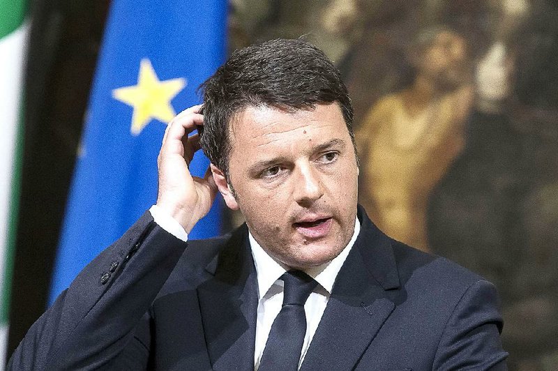 Italian premier Matteo Renzi talks to journalists during a press conference he held after a meeting with his top ministers in an emergency strategy session, in Rome, Sunday, April 19, 2015. A crowded fishing boat that one survivor said carried 700 migrants capsized north of Libya overnight, and only a few dozen people were rescued Sunday, raising fears that it could become the Mediterranean's deadliest known migrant sea disaster. Renzi sayd officials are "not in a position to confirm or verify" that the boat had 700 people aboard, as one survivor told rescuers, but said that so far there were 28 survivors and 24 dead. (Angelo Carconi/ANSA via AP) ITALY OUT