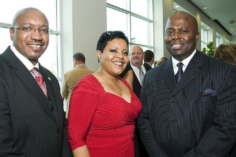 Marvin Burton — deputy superintendent of the Little Rock district — as interim leader is shown in this file photo from 2013 with Pam Smith and Dr. Dexter Suggs.
