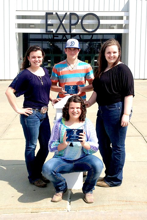 Submitted Photo Members of the Decatur FFA Livestock Judging Team traveled to the Expo Center in Claremore, Okla., March 25. Members of the team included Lacy Barrett (left), Joey Barnes, Samantha Goble and Paige Barrett (seated).