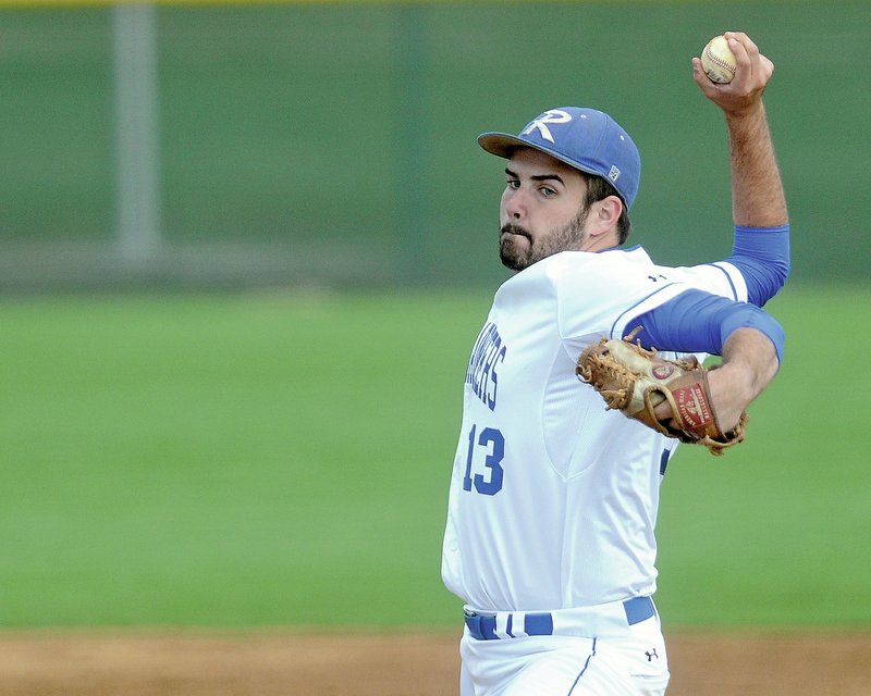 NWA Democrat-Gazette/J.T. WAMPLER Billy Treacy, Rogers High pitcher, sends in a pitch Tuesday against Bentonville.