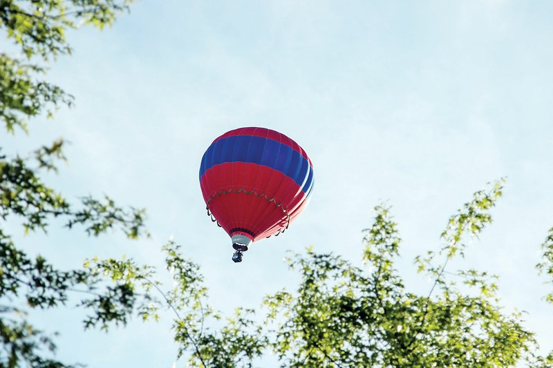 A balloon floats above Russellville in the inaugural Balloons Over RussVegas event in 2014. Balloons will launch at sunrise May 2 and 3 from the Russellville Soccer Complex, 901 Lock and Dam Road, and will be in the air for a couple of hours, promoter Rodney Williams said. People may sign up to take rides in the balloons, as well as go tandem skydiving. Tethered balloon rides will be offered in the mornings and evenings. The event includes a charity dog walk, live entertainment and food as well. For more information, go to www.balloonsoverrussvegas.com.