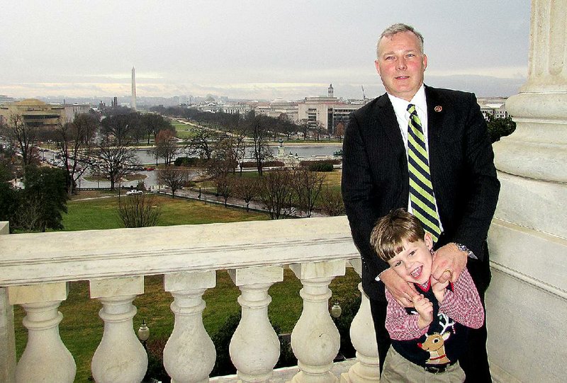Arkansas Lt. Gov. Tim Griffin is shown with his son John Griffin in this file photo.