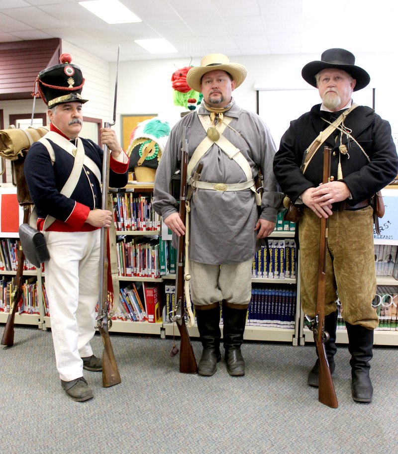 MEGAN DAVIS MCDONALD COUNTY PRESS Carlos Valdez, Andy Patrick and Mike Patrick spoke to students at Anderson Elementary School to provide a new perspective on the Battle of the Alamo.