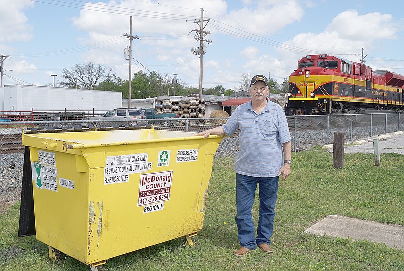 RITA GREENE MCDONALD COUNTY PRESS John Lafley, mayor of Noel, stands by a recycling bin that will be used during the citywide cleanup.
